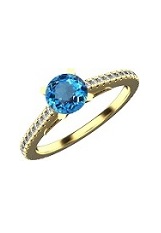 lovely solid gold blue topaz baby birthstone ring